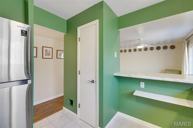 13485 Coliseum Dr Unit G, Chesterfield, MO 63017 - bathroom with tile patterned flooring, a ceiling fan, and baseboards