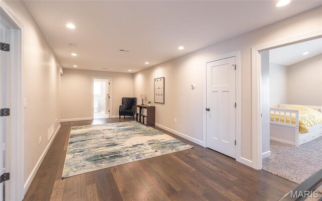 1201 Aster Ct, St James, MO 65559 - hall featuring dark wood finished floors, baseboards, and recessed lighting