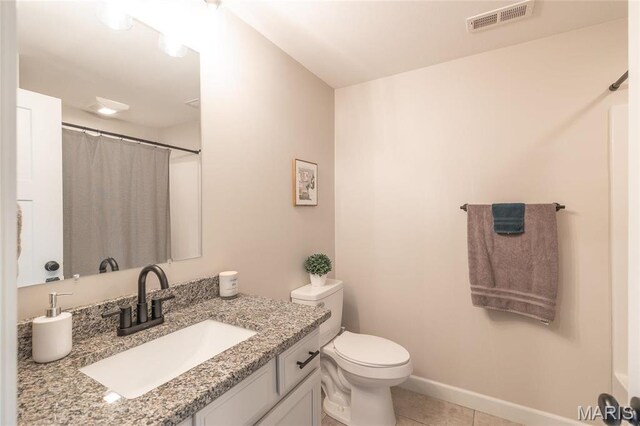 1201 Aster Ct, St James, MO 65559 - full bath featuring tile patterned floors, vanity, toilet, and a shower with curtain