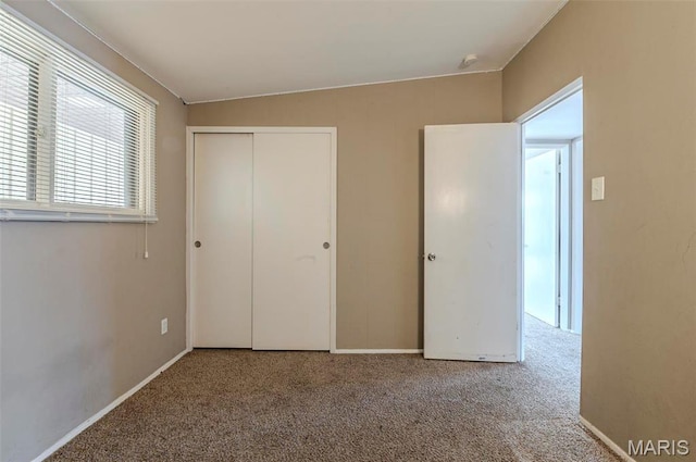 5 Little Ln, Florissant, MO 63033 - unfurnished bedroom with carpet, a closet, and baseboards