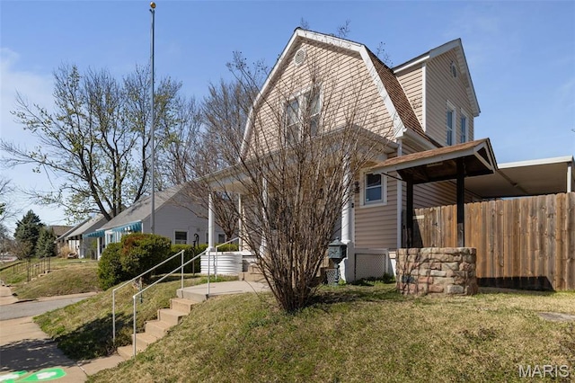 5839 W Park Ave, Saint Louis, MO 63110 - back of house with a gambrel roof