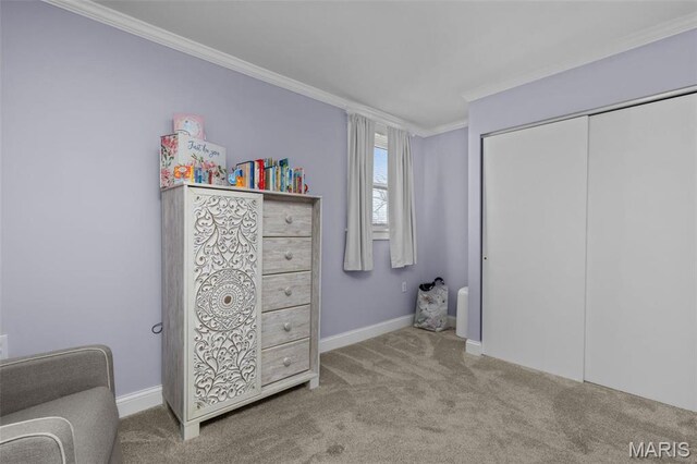 5839 W Park Ave, Saint Louis, MO 63110 - carpeted bedroom with ornamental molding, baseboards, and a closet