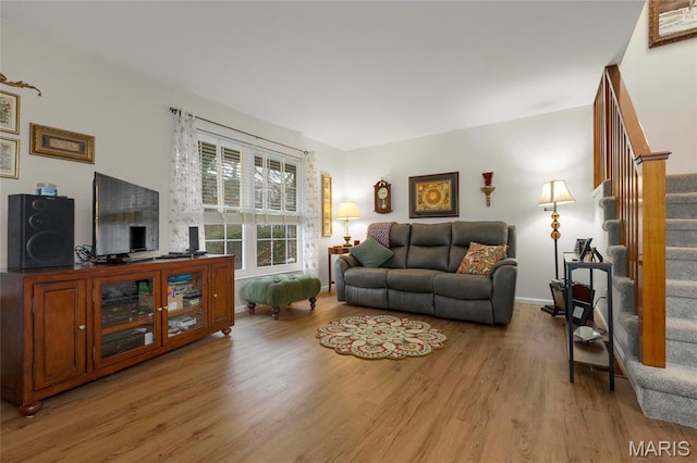 13459 Coliseum Dr, Chesterfield, MO 63017 - living room with stairs and light wood-style floors