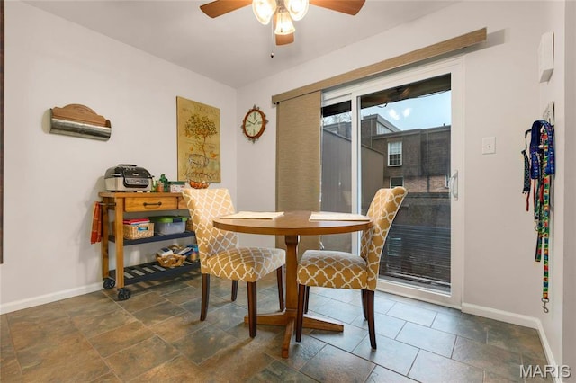 13459 Coliseum Dr, Chesterfield, MO 63017 - dining area featuring baseboards and a ceiling fan