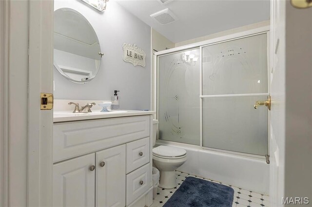13459 Coliseum Dr, Chesterfield, MO 63017 - bathroom featuring bath / shower combo with glass door and vanity