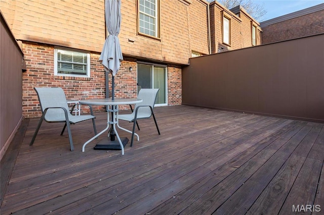 13459 Coliseum Dr, Chesterfield, MO 63017 - wooden terrace featuring outdoor dining space