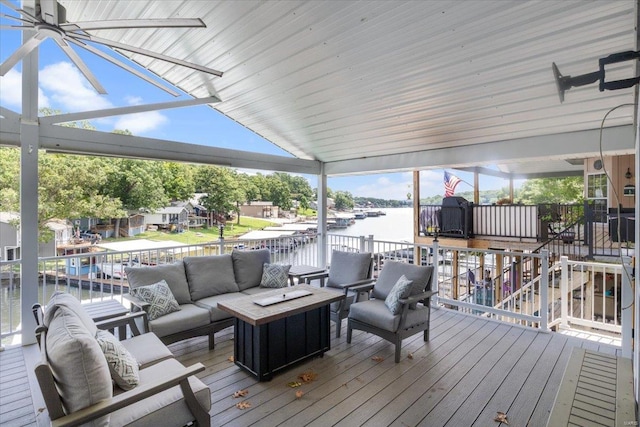 29420 Park Ave, Gravois Mills, MO 65037 - deck featuring an outdoor hangout area and a water view