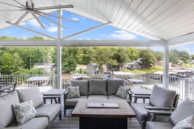 29420 Park Ave, Gravois Mills, MO 65037 - view of patio with outdoor lounge area and a water view
