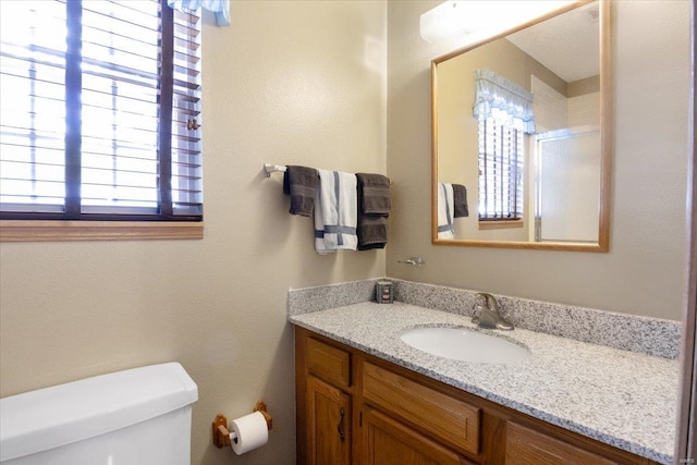 29420 Park Ave, Gravois Mills, MO 65037 - bathroom with toilet, vanity, and an enclosed shower