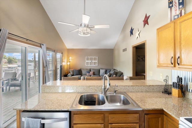 29420 Park Ave, Gravois Mills, MO 65037 - kitchen featuring a sink, stainless steel dishwasher, ceiling fan, high vaulted ceiling, and open floor plan