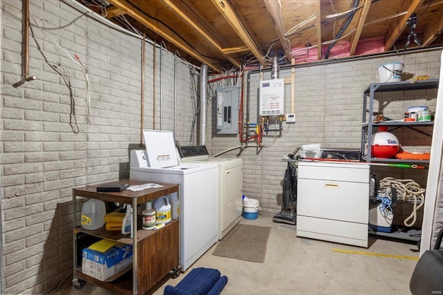 29422 Park Ave, Gravois Mills, MO 65037 - laundry room featuring independent washer and dryer, electric panel, water heater, and brick wall