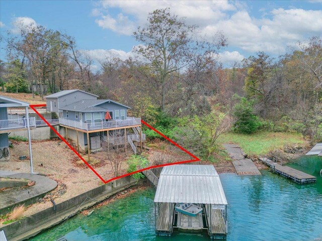 29422 Park Ave, Gravois Mills, MO 65037 - dock area featuring boat lift and a deck with water view