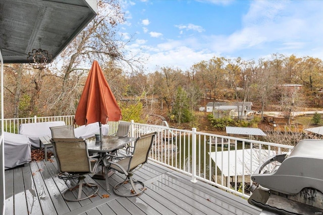 29422 Park Ave, Gravois Mills, MO 65037 - deck featuring outdoor dining area