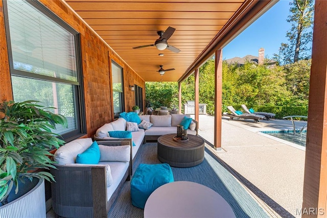 16 Holiday Ln, Saint Louis, MO 63131 - view of patio featuring an outdoor hangout area, a ceiling fan, and an outdoor pool