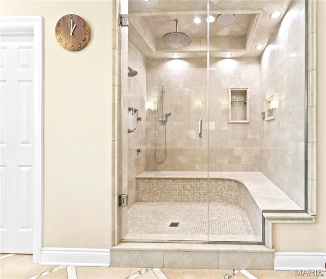 16 Holiday Ln, Saint Louis, MO 63131 - full bathroom featuring a stall shower, tile patterned floors, recessed lighting, a tray ceiling, and baseboards