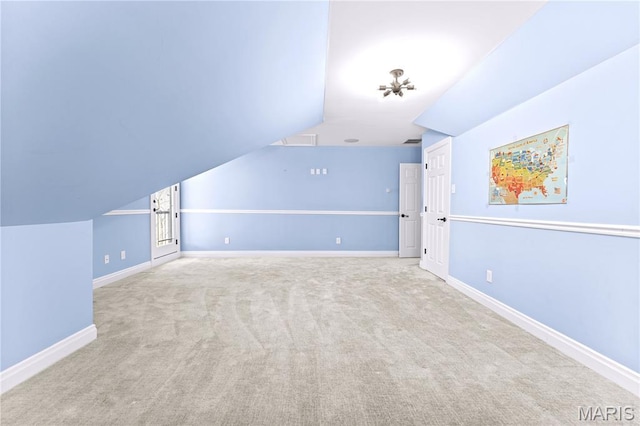 16 Holiday Ln, Saint Louis, MO 63131 - bonus room with carpet flooring, vaulted ceiling, and baseboards