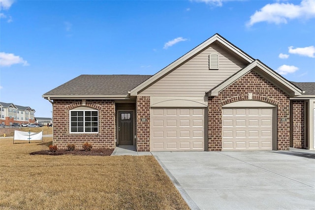ranch-style home with brick siding, driveway, an attached garage, and a front lawn