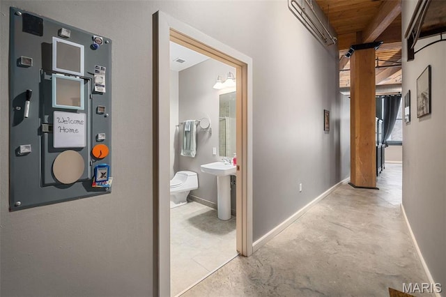 901 Washington Ave Unit 304, Saint Louis, MO 63101 - hallway featuring concrete flooring