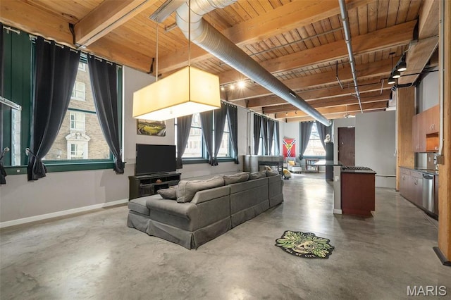 901 Washington Ave Unit 304, Saint Louis, MO 63101 - living area with a wood ceiling with exposed beams and concrete floors