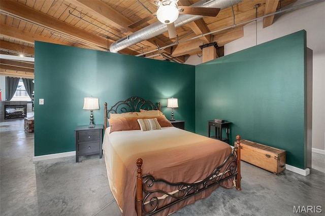 901 Washington Ave Unit 304, Saint Louis, MO 63101 - bedroom with a wood ceiling with exposed beams and concrete floors