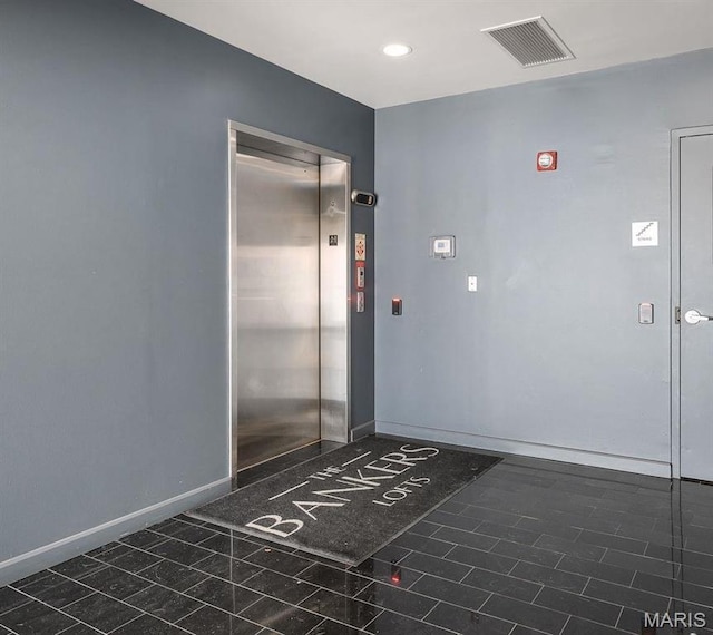901 Washington Ave Unit 304, Saint Louis, MO 63101 - interior space with elevator, recessed lighting, and tile patterned floors