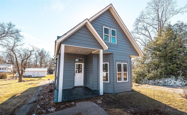 120 E Charles St, St James, MO 65559 - rear view of house featuring a porch