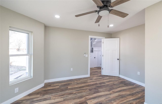 120 E Charles St, St James, MO 65559 - empty room featuring recessed lighting, baseboards, dark wood-style flooring, and ceiling fan