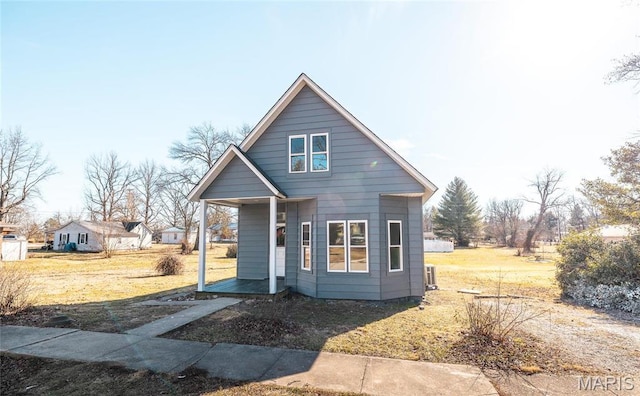 120 E Charles St, St James, MO 65559 - view of front of property with a porch and a front yard