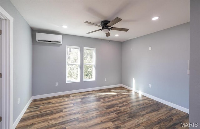 120 E Charles St, St James, MO 65559 - spare room featuring a wall mounted air conditioner, ceiling fan, wood finished floors, and recessed lighting