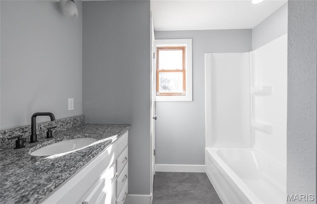 120 E Charles St, St James, MO 65559 - bathroom with vanity and shower / bathtub combination