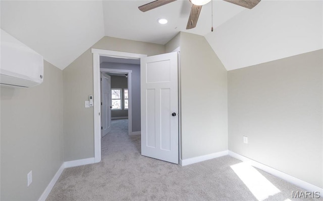 120 E Charles St, St James, MO 65559 - additional living space with ceiling fan, vaulted ceiling, an AC wall unit, and light colored carpet