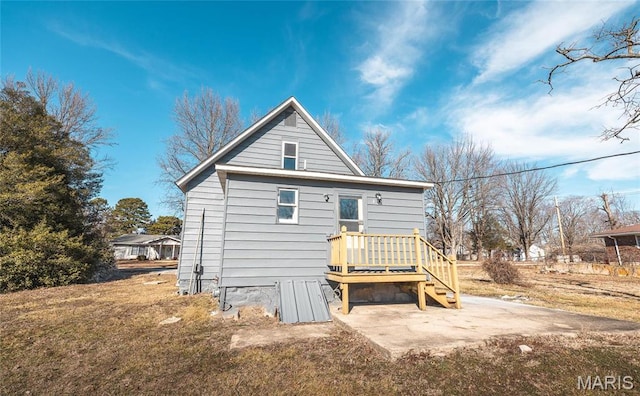 120 E Charles St, St James, MO 65559 - rear view of house with a patio area