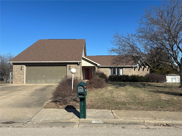 809 Cambridge Dr, Rolla, MO 65401 - view of front of property with brick siding, an attached garage, driveway, a shingled roof, and a front lawn