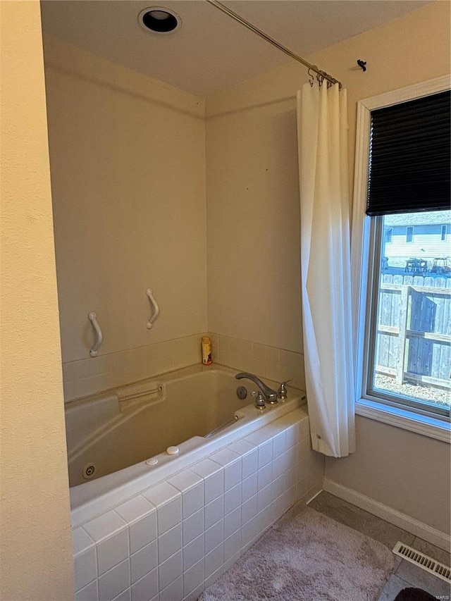 809 Cambridge Dr, Rolla, MO 65401 - full bathroom with tiled shower / bath combo