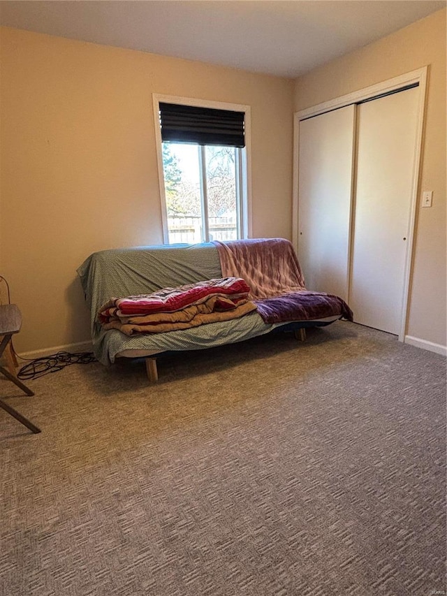 809 Cambridge Dr, Rolla, MO 65401 - bedroom featuring a closet, carpet flooring, and baseboards