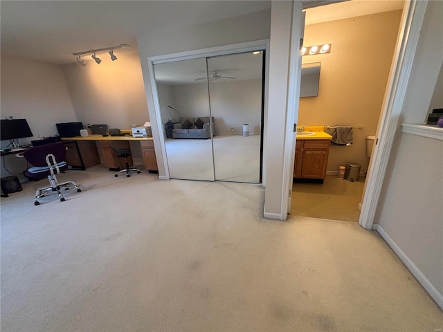 809 Cambridge Dr, Rolla, MO 65401 - carpeted office with a ceiling fan and rail lighting