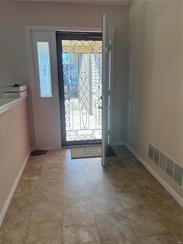 809 Cambridge Dr, Rolla, MO 65401 - foyer entrance featuring baseboards and light tile patterned flooring