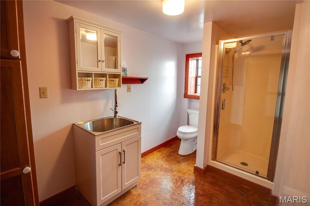 40 Country Ln, Wood River, IL 62095 - full bathroom with a stall shower, toilet, vanity, and baseboards