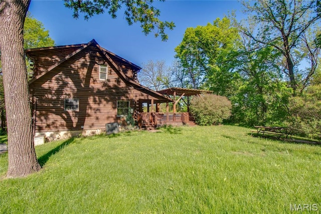 40 Country Ln, Wood River, IL 62095 - back of property with a wooden deck and a lawn
