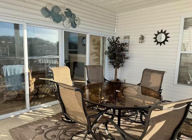 275 Flynn Rd Unit 105, Lake Ozark, MO 65049 - sunroom featuring outdoor dining area