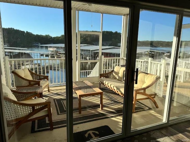 275 Flynn Rd Unit 105, Lake Ozark, MO 65049 - sunroom with a water view
