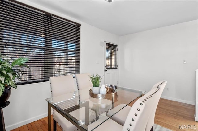 704 Soulard St Unit 704, Saint Louis, MO 63104 - dining space featuring wood finished floors and baseboards