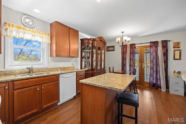 10949 Clearwater Ln, Plainview, IL 62685 - kitchen featuring white dishwasher, a sink, plenty of natural light, a chandelier, and recessed lighting