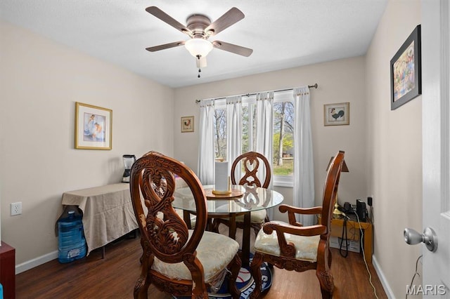 10949 Clearwater Ln, Plainview, IL 62685 - dining area with wood finished floors, baseboards, and ceiling fan