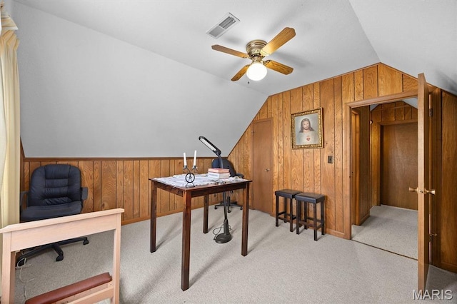 10949 Clearwater Ln, Plainview, IL 62685 - carpeted home office with vaulted ceiling, wood walls, and a ceiling fan