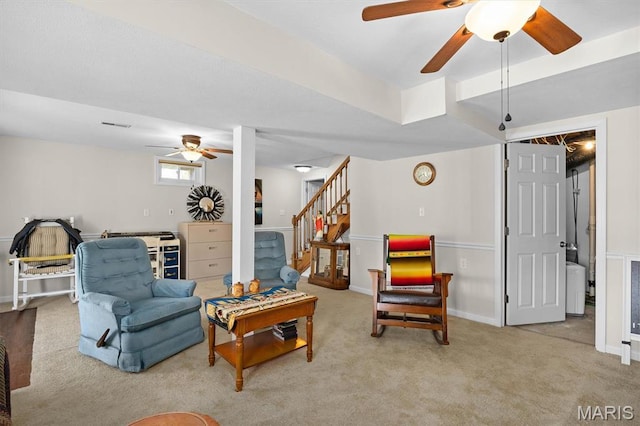 10949 Clearwater Ln, Plainview, IL 62685 - carpeted living room with ceiling fan, stairway, and baseboards