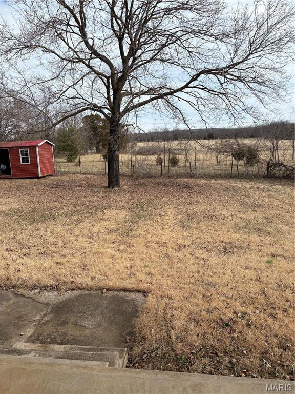10019 Seabourne St, Belgrade, MO 63622 - view of yard with a shed and an outdoor structure