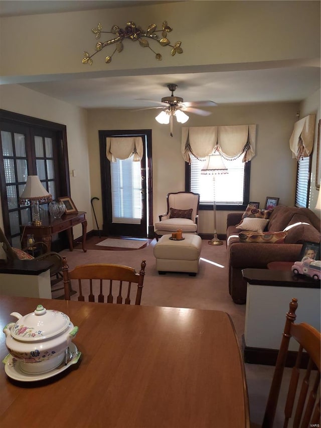 2106 Lackland Rd, Saint Louis, MO 63114 - dining area featuring ceiling fan, baseboards, and carpet floors