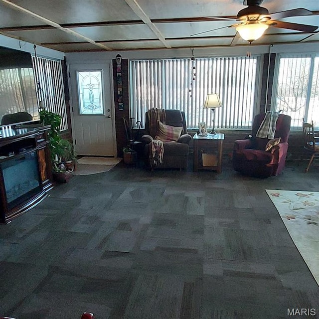 2106 Lackland Rd, Saint Louis, MO 63114 - living area featuring carpet flooring, healthy amount of natural light, and ceiling fan