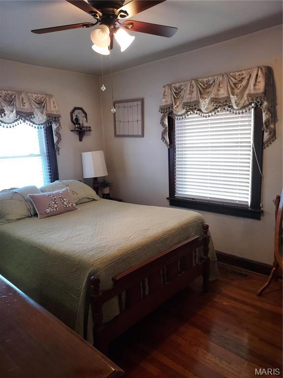 2106 Lackland Rd, Saint Louis, MO 63114 - bedroom featuring wood finished floors and a ceiling fan